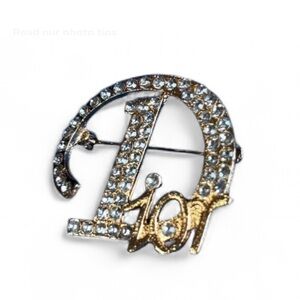 Gold and Crystal Logo Brooch